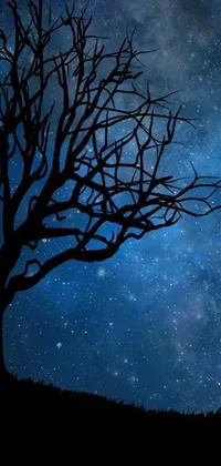 This stunning mobile live wallpaper showcases a mystical tree atop a hill against a serene night sky