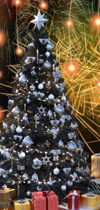 Looking for a festive Christmas live wallpaper for your phone? Look no further than this stunning design featuring a digital rendering of a beautifully decorated Christmas tree surrounded by presents and fireworks