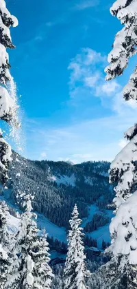 This live wallpaper captures the thrill of skiing down a snow-covered slope