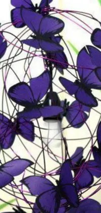 This stunning phone live wallpaper depicts an arrangement of purple butterflies hanging from a ceiling, rendered in an intricate net art style