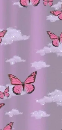 A stunning phone live wallpaper featuring pink butterflies fluttering in the sky above the clouds