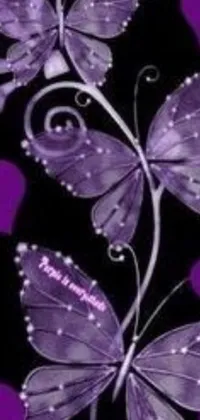 This live wallpaper showcases lovely purple butterflies and hearts on a sleek black background, creating a captivating and charming atmosphere for your phone