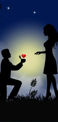Add a touch of romance to your mobile device with this live wallpaper featuring a man kneeling in front of a woman holding a heart