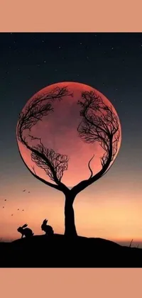 Get transported into a surreal, dreamlike space with a phone live wallpaper featuring a huge red moon and a simple fractal tree