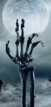 Get ready for a spooky wallpaper experience with a phone live wallpaper featuring a zombie hand sticking out of a grave! This fantastical wallpaper comes complete with a full moon backdrop, a creepy statue silhouette, and long, menacing claws