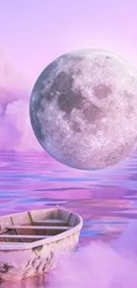 This phone live wallpaper displays a surrealistic scene of a small boat floating on top of a tranquil body of water