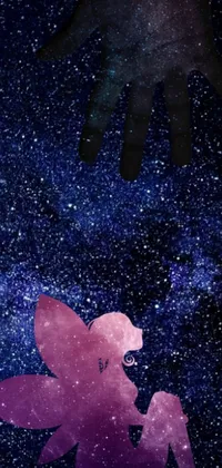 This phone live wallpaper features a woman relaxing on a bed underneath a star-filled night sky