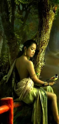 This stunning phone live wallpaper depicts a mesmerizing goddess character seated on a bench next to a tree in mystical Bali