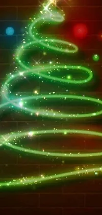 This stunning phone live wallpaper features a glowing Christmas tree on a brick wall, with bright green swirls coming up it
