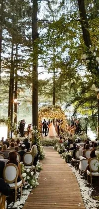 This woodland live wallpaper depicts a dreamy wedding ceremony in a forested area