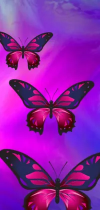 This phone wallpaper features gorgeous, brightly colored butterflies in flight on a stunning purple and blue background