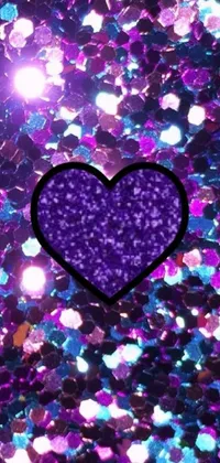 This phone live wallpaper features a stunning purple heart surrounded by purple and blue confetti against a dreamy glittery background