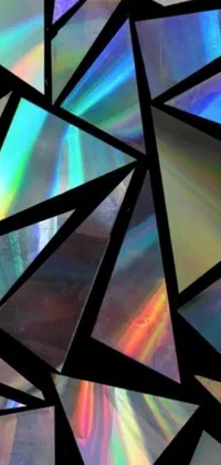 This stunning live phone wallpaper features a close-up of a vibrant stained-glass surface, showcasing a crystal cubism style of repetitive, triangular shards