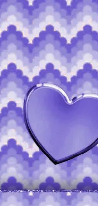 This beautiful phone live wallpaper features a heart-shaped object set against a vibrant purple background