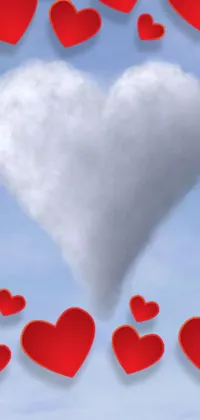 This is a stunning phone live wallpaper featuring a heart-shaped cloud against a blue sky
