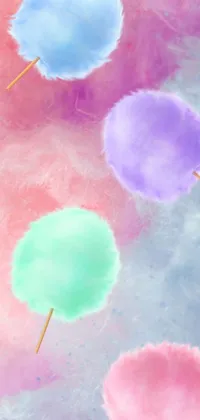 This live phone wallpaper features a delightful cotton candy on a table with a pastel background in calming hues