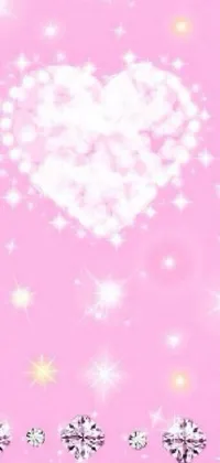 This phone live wallpaper consists of a pink background with a glittering heart of diamonds, accompanied by a glimmering star