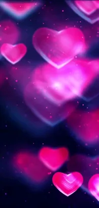 This live phone wallpaper features an array of lovely pink hearts floating against a deep purple background that emanates a gentle glow