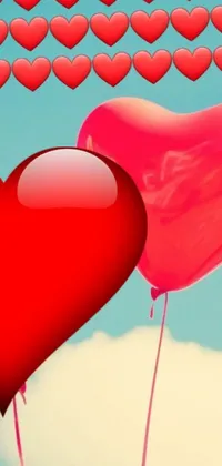 This vibrant phone live wallpaper boasts a bunch of red heart balloons that gently twirl against a sunny blue sky backdrop