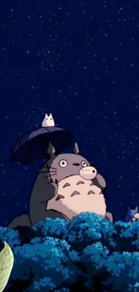 Get the adorable Totoro Phone Live Wallpaper featuring a cute totoro sitting atop a green hill with an umbrella on a clear night sky that will surely brighten up your day
