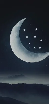 Enhance the look of your phone screen with this stunning live wallpaper featuring a night sky, a crescent moon, and twinkling stars