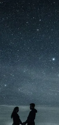 This live wallpaper depicts a romantic starry sky scene of a couple holding hands under the starry sky