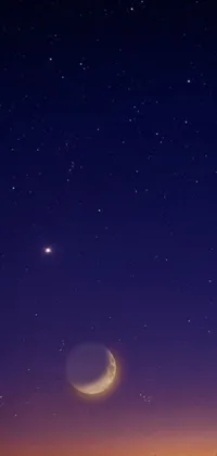 This compelling phone live wallpaper features a striking crescent and star set against a dark nighttime sky