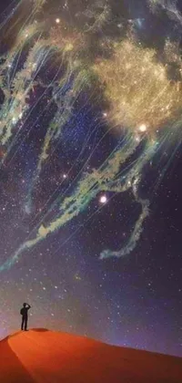 This phone live wallpaper features a stunning digital art piece depicting a man standing on top of a sandy dune amidst a galaxy with cosmic energy wires