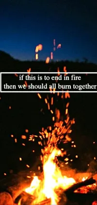 Get this mesmerizing live wallpaper featuring a burning campfire, powerful lyrics, and exploding scenes