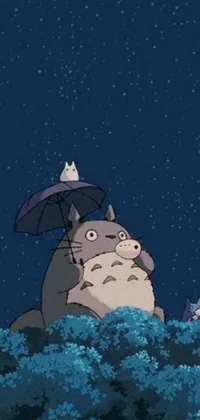 This phone live wallpaper showcases a charming Totoro figure, lounging atop a lush hill beneath a multi-colored umbrella