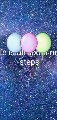 Looking for a vibrant and dynamic phone wallpaper? Look no further than this live wallpaper featuring three colorful balloons with the words "life is all about next steps" in white font