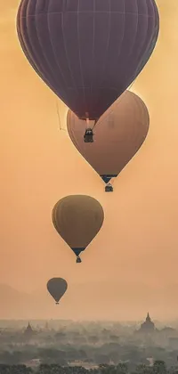 Take a ride into the endless sky with the Hot Air Balloon Live Wallpaper