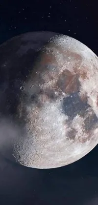 Looking for a mesmerizing live wallpaper for your phone? Check out this image of a moon in the sky, leaked from NASA and set against a misty space background