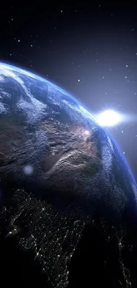 This live wallpaper features a stunning view of the earth from space, illuminated by city lights and lightning