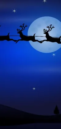 This phone live wallpaper showcases a breathtaking digital art of a flying reindeer sleigh in front of a full moon