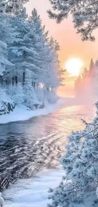 This breathtaking phone live wallpaper depicts a serene winter scene of a river flowing through a snow-covered forest at sunrise