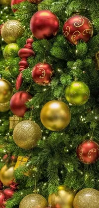 This phone live wallpaper features a stunning, fully-colored close-up of a Christmas tree adorned with beautiful ornaments in olive green and Venetian red
