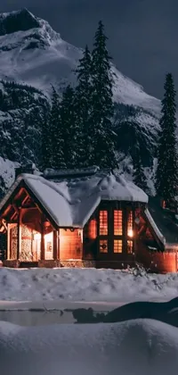 This live wallpaper brings the tranquil beauty of a winter cabin to your phone