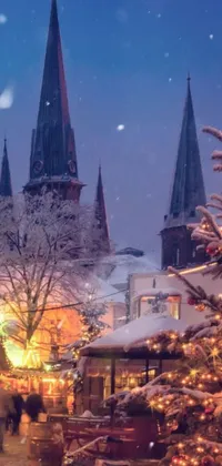 This live wallpaper captures a stunning Christmas scene depicting a group of people walking through a snowy city with a beautiful Christmas tree and cathedral in the background