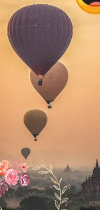 Add some joy to your phone with this surreal live wallpaper featuring colorful balloons floating above a lively flower-filled background with clouds