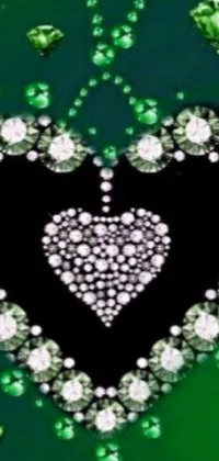 The Heart of Diamonds Live Wallpaper features a stunning diamond heart against a vibrant green backdrop