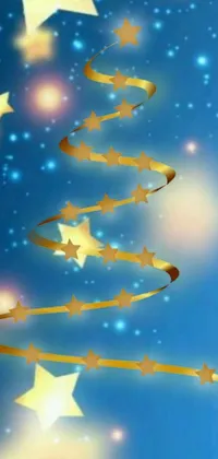 This dynamic Christmas live wallpaper features a tree formed from golden stars, blue and yellow ribbons, with Saturn and a spiral of stars in the sky