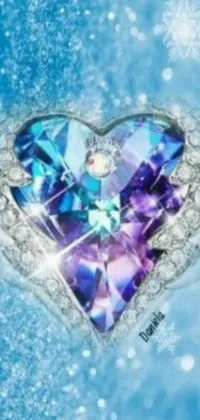 This phone live wallpaper displays a heart ring on a sparkling, snow-covered background in shades of blue and purple