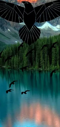 This phone live wallpaper showcases a breathtaking scene of a flock of birds in flight over a tranquil lake, set against the magnificent backdrop of Banff National Park's rocky mountains