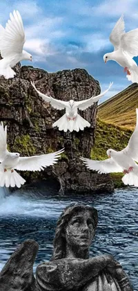 This phone live wallpaper features a beautiful illustration of pure white birds flying over a serene water body with cascading waterfalls in the background