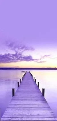 This live wallpaper features a picturesque dock floating on a calm body of water in beautiful shades of light purple