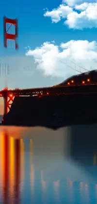 This phone live wallpaper exhibits the Golden Gate Bridge dazzling at night