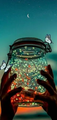 This phone live wallpaper showcases a captivating digital art piece featuring a jar filled with flickering lights that resemble fireflies