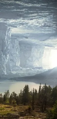 This phone live wallpaper features an expansive ice cave situated amidst a forest