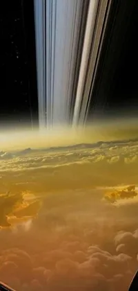 This phone live wallpaper features a detailed view of Saturn as seen from a space station